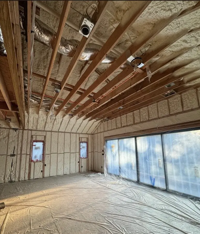 Interior walls and ceiling insulated with spray foam during new construction in Findlay